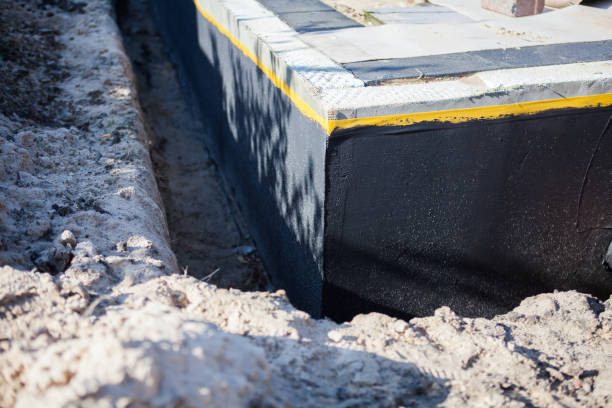 Professional Exterior Waterproofing technician working in Geneva, NY